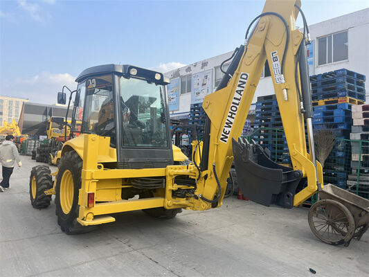 中古 New Holland LB95B-4PT バックホーローダー、4-in-1多目的バケット、パイロットコントロール、ROPS/FOPSエンクローズドキャブ付き